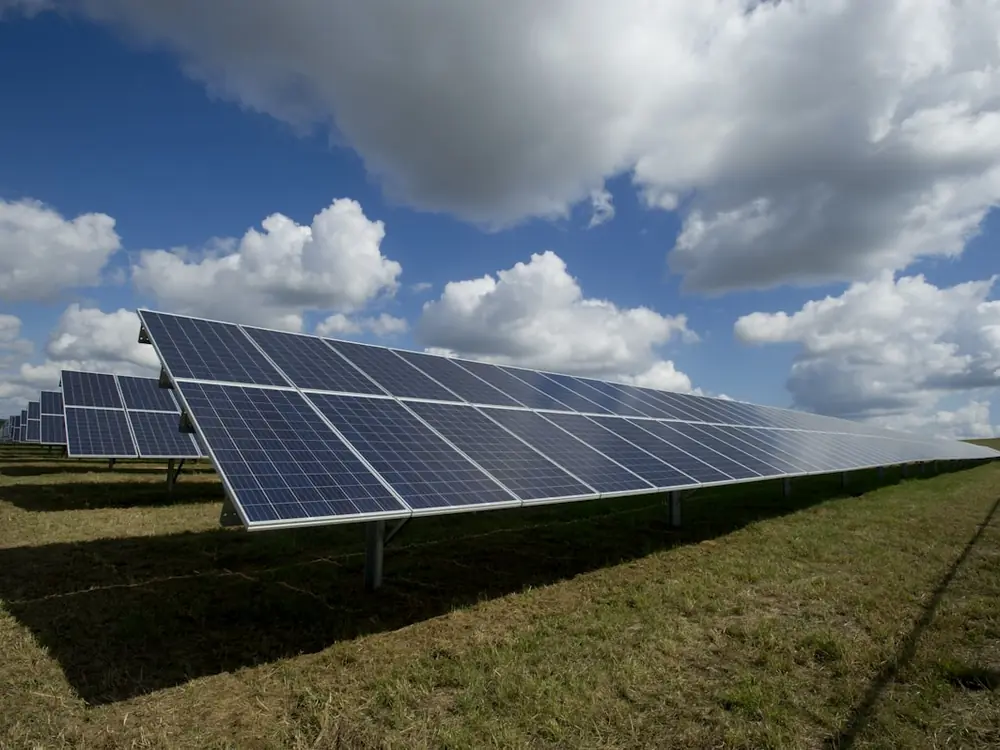 Ground-mounted community solar farm in a field